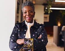 Closeup of senior woman smiling in office