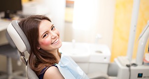 Smiling woman in dental chair