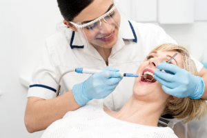 woman at dental cleaning